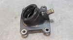 Yamaha YZ80 Intake Manifold Carburetor Boot Joint Holder Insulator 1986-1992 Used. Price: $26.00.